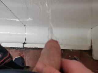 Peeing in a Victorian Style Urinal
