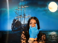 Glove fetish. Dominatrix Nika puts on medical gloves and tears them with long nails