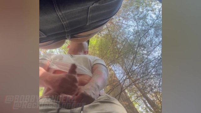 Bent over between some trees, he gets it rough and raw