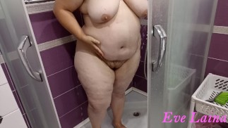 Mature, curvy milf with a big, cellulite ass and big tits takes a shower.