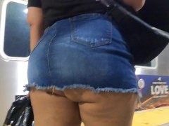 Wife at train station in jean mini skirt