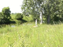 Milf sexy woman sunbathing naked on river bank. Wild beach nudist. Naked in public. Ass. Pussy. POV