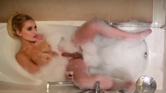 Shemale masturbating in the bathtub