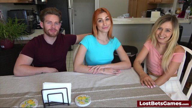 Two skinny babes lose a strip game and give him a blowjob