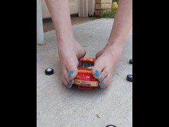 Destroying a model racecar toy with my barefeet smashing it into pieces
