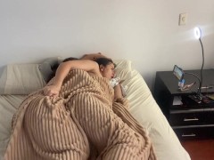 Lesbian sex under the covers on a cold morning