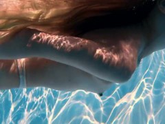 Big boobs blonde babe swimming 15/16