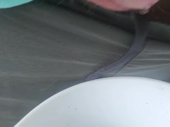 Pissing all over the toilet and wall