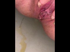 Loud pee close up in the tub, girl pissing
