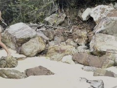 Monika Foxxx masturbates with a big dildo on a white sand beach