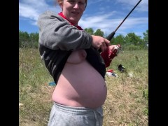 Cute pregnant milf flashes old guys fishing across from her when she sees them staring
