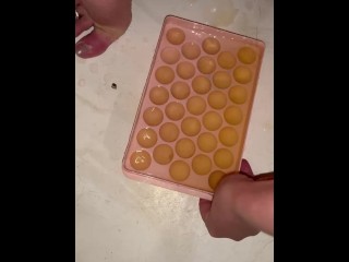 Girl Fills Ice Cube Tray with Piss
