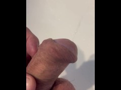Guy takes morning piss in the sink
