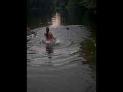 Amateur Redhead gets naughty and flashes tits @ public beach while swimming with her Rottweiler
