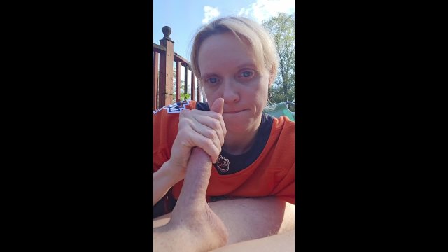 Hockey Mom giving an outdoor Blowjob