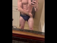 Hot muscular guy strip teases his ripped physique