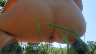 Close up MILF pissing outside