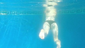 Ariel Ortiz visits Murcia,she is like a mermaid in the sea,she swims on the beach or pool