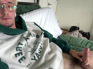 young gay twink jerks off in hoodie in bed