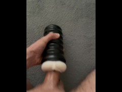 masturbation of a small penis while the woman is in the kitchen