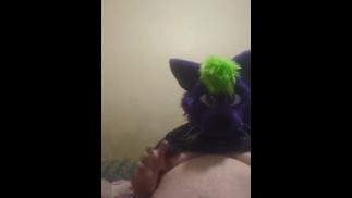 Big fat furry plays with massive belly