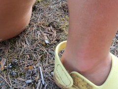 Girl masturbates on the bank of a beautiful river