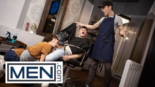 The Owner Of A Sexy Hair Salon Sucks The Barber's Cock Beneath His Cape