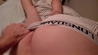 Showing off my ass and bulge in white briefs