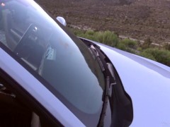 Fucking her on the car in the middle of the desert