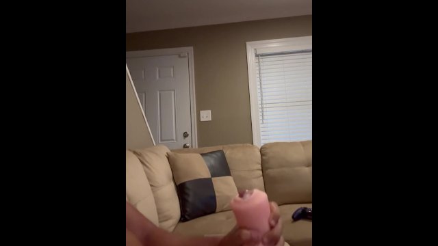Stud can’t hold back his load before he shoots cum through fleshlight while moaning