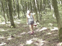 Sexy cute Milf without panties under skirt picks mushrooms in forest. Outdoor Outside In public Solo
