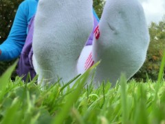 foot worship bare and in socks in public outdoor