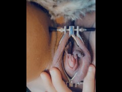 Clamp labia upclose pussy