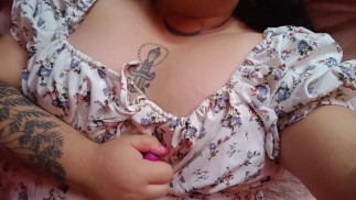 Coquette girl masturbates with a purple dildo