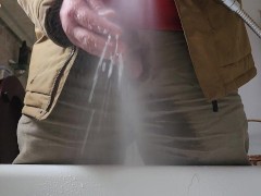 Pissing at home with a jacket