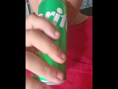 Man enjoying a sprite, licking and smacking lips