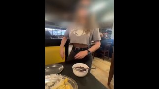 Showing breasts in the restaurant