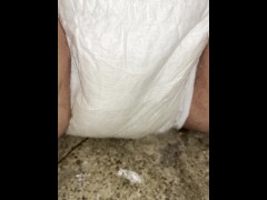 Babe wets her diaper outside while it becomes drenched in piss 5/16