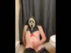 Halloween Ghostface pours hot red wax all over