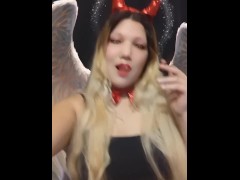 Angel of hell. Halloween costume. Cute girls smoke with me