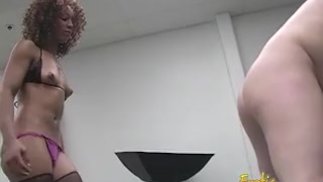 Lusty ebony slut makes a stiff cock cum by using her hands