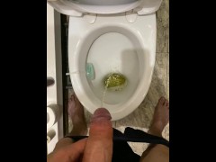 Morning pissing in the toilet with an uncircumcised penis, view from the eyes