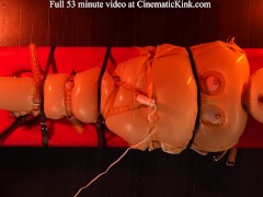 Anna Kovachenko in inflatable latex sack