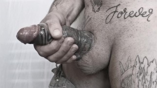 Girthy tattooed dick cumshot