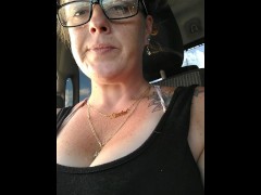 Natural boobs bouncing up and down while I smoke cigerette while getting a ride in car