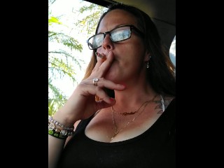 Cute MILF Smoking Cigeratte in Car