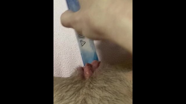 Fucking my extreme tight pussy with a glue stick again.View from up.Wet pussy sounds