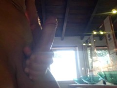 Jerking off my cock in a public bathroom until I cum and almost get caught