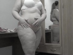 Trying on panties and bras.