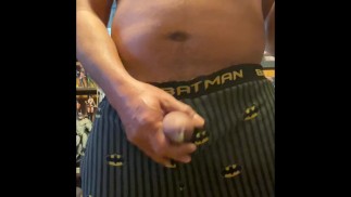 Lazy Sunday morning masturbation - I slide my dick thru the fly of my Batman pj pants to a nice load